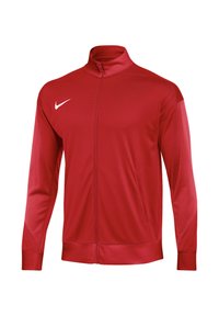 Red athletic jacket made of lightweight, textured fabric. Features a zip front, high collar, and white Nike logo on the left chest.