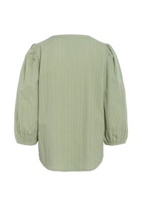 Blouse longue à manches longues vert clair avec des rayures verticales, des manches bouffantes froncées et des poignets élastiques, vue de dos.