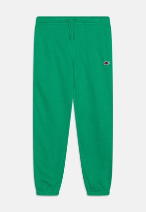 Pantalon de survêtement vert avec poignets et taille élastiques, fermeture à cordon, et petit logo Champion sur la cuisse gauche.