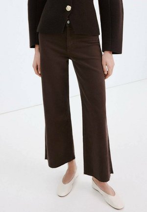 Vaqueros a campana - brown