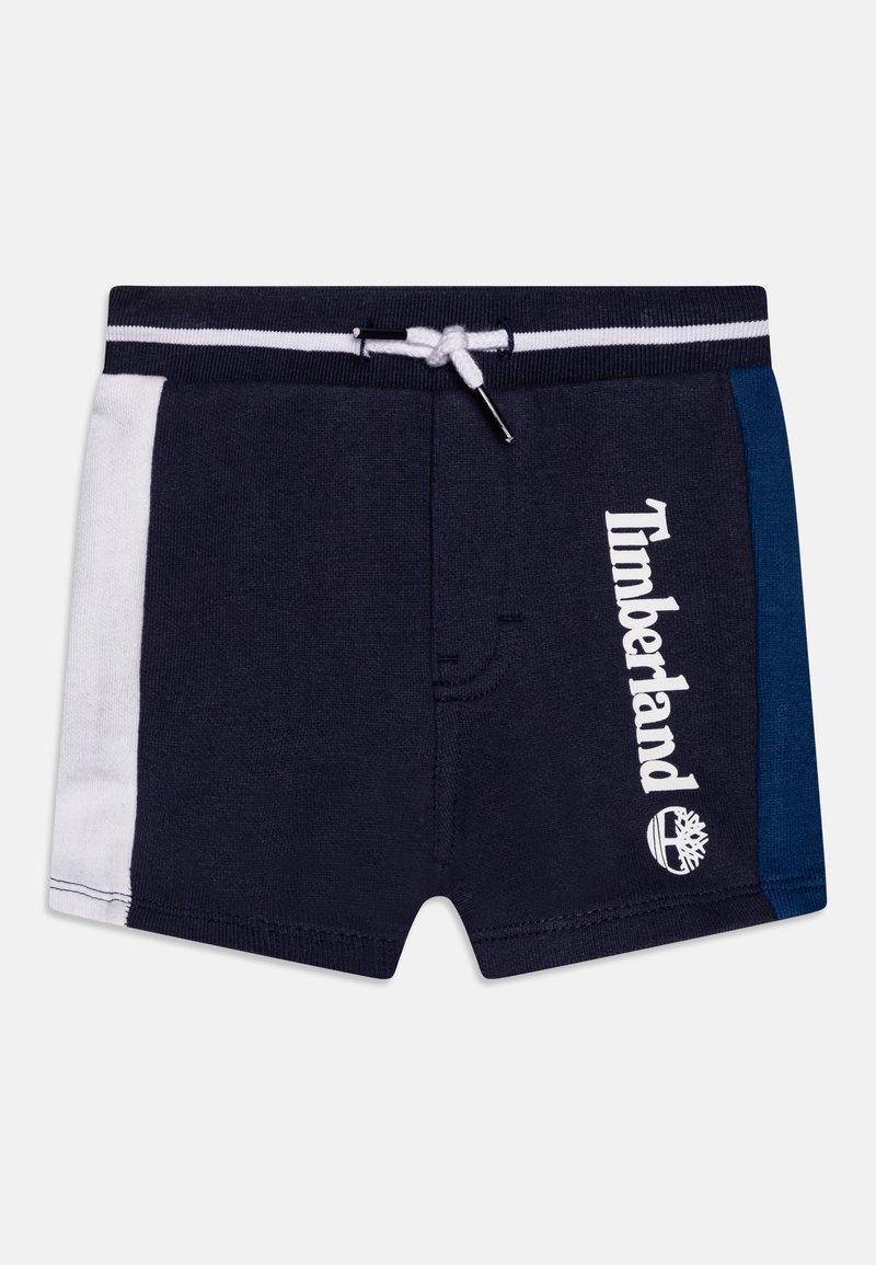 Mörkblå badshorts med vita och blå sidopaneler, elastisk midja, dragsko och Timberland-logotyp tryckt i vitt.