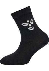 Svart bomullsankelsocka med en vit biegrafik på utsidan. Designen inkluderar en ribbad manschett och en slät textur.