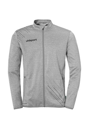 Jasnoszara kurtka na pełny zamek z czarnymi ukośnymi wzorami przypominającymi zadrapania, długie rękawy, wysoki kołnierz oraz logo "uhlsport" na lewym piersi.