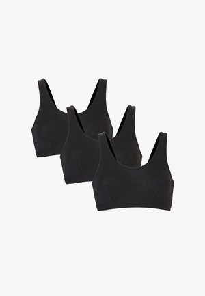 Des soutiens-gorge de sport noirs dans un pack de trois, présentant un design sans couture, léger, en tissu doux et avec une large bande sous poitrine confortable.