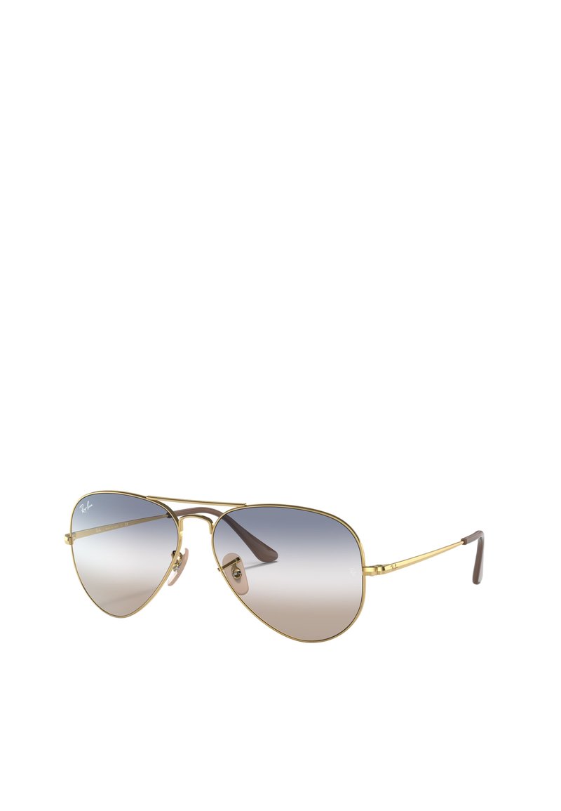 Occhiali da sole Ray-Ban aviator con montatura in metallo dorato, lenti grigie a gradiente e punte delle aste in acetato marrone. Presentano cuscinetti nasali regolabili.