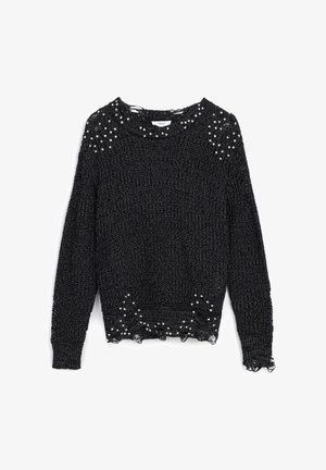 Black knitted sweater with pearl embellishments on the shoulders and hem. Features a loose weave, frayed edges, and a round neckline.