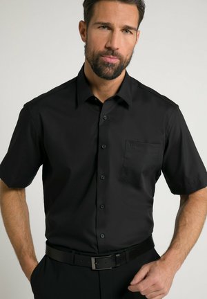 Short-sleeve black button-up shirt made of smooth fabric, featuring a chest pocket, and a standard collar with a minimalist design.