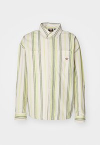 Camisa de botones en rayas verde claro y crema, con un bolsillo en el pecho, mangas largas y dobladillo redondeado. Tejido de mezcla de algodón.