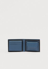 Blue and black bifold wallet open to show card slots on left and a flap pocket on right against plain background.