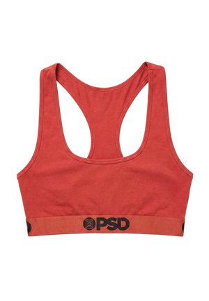 Reggiseno sportivo rosso con spalline a incrocio sulla schiena e logo "PSD" nero sulla fascia elastica in fondo.