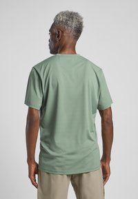 Jack Wolfskin DELGAMI S/S  - T-Shirt sport - eucalyptus