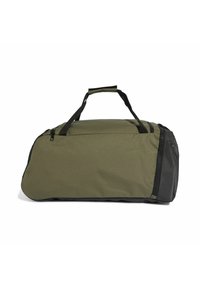 Olivengrøn duffelbag med sort bund, top-håndtag og Lynlås i siden. Lavet af slidstærkt stof med en struktureret overflade for bedre greb.