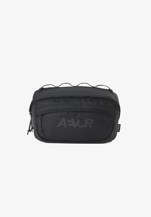 Black fabric crossbody bag with a textured surface, featuring a zippered closure, adjustable cord, and a prominent AEAVOR logo on the front.