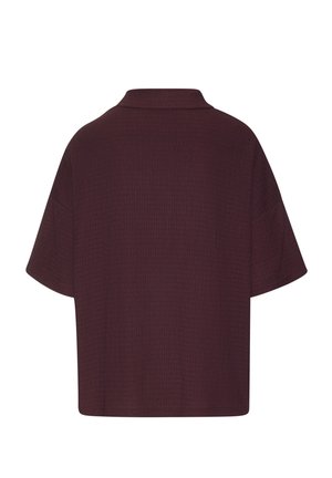 Dark burgundy short-sleeve shirt with a boxy fit and a small, flat collar, shown from the back on a white background.
