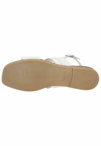 Sandal bianco con tomaia sintetica liscia, fibbia regolabile e suola in gomma marrone testurizzata. Taglia 37 contrassegnata sulla suola.