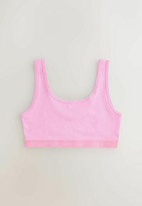 Top roz fără mâneci, scurt, cu bretele late și tiv elastic ajustat pe un fundal deschis simplu.