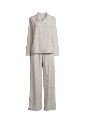 Lichtbeige blouse met lange mouwen en knopen, gecombineerd met wijde, bijpassende broek, gemaakt van glad, lichtgewicht stof.