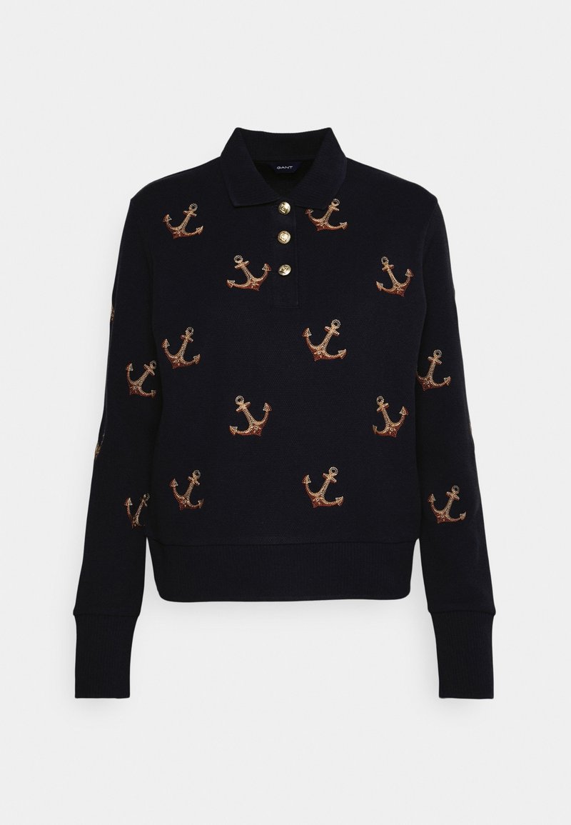 Maglione navy con colletto, caratterizzato da bottoni dorati e ancore ricamate sparse in tonalità rosse e dorate. Polsini e orlo a coste.