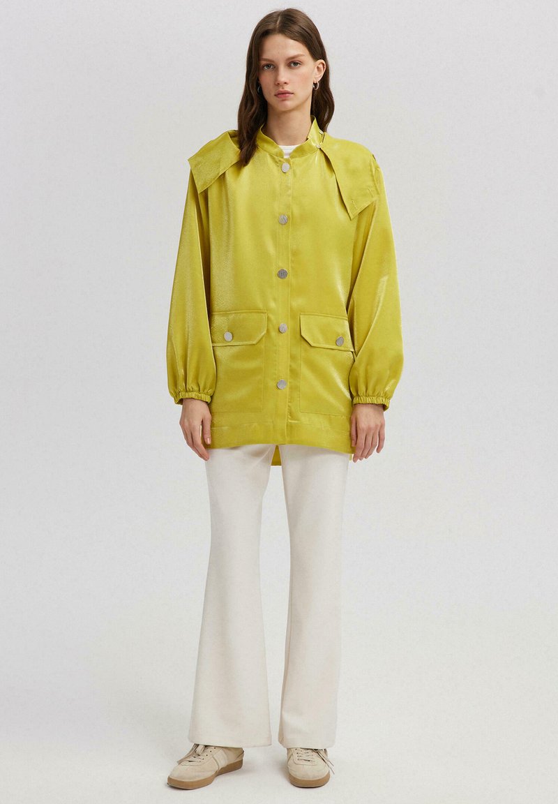 Touché Privé Jas groen