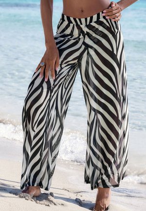 Zwart-witte doorschijnende wijde broek met een zebrapatroon, met een comfortabele tailleband en een vloeiende pasvorm.
