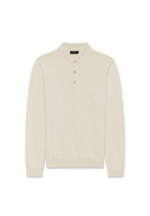 Beige langemouw polo shirt gemaakt van zachte stof, met een puntige kraag, een drieknops sluiting en geribbelde manchetten. Geen patronen of accenten.