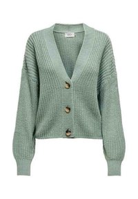 Ljusgrön stickad cardigan med V-hals, sänkta axlar och tre stora bruna knappar framtill. Strukturerad tyg, ribbade ärmslut.