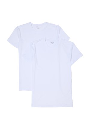 Dos camisetas blancas lisas de manga corta y cuello redondo superpuestas, mostrando vista frontal sobre un fondo blanco.