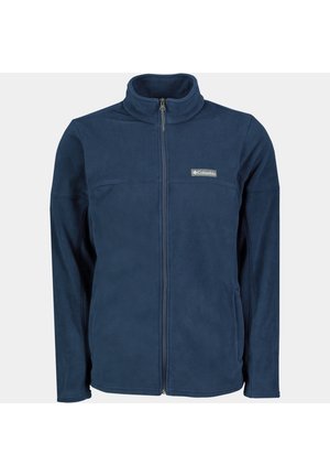 Veste en polaire bleu marine avec col montant, fermeture éclair intégrale et un petit logo de la marque sur la poitrine. Texture douce avec une finition lisse.