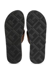 Talpa de sandale maro cu o bază texturată din cauciuc negru, având un model geometric pentru aderență și durabilitate. Margini netede și formă conturată.