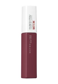 Maybelline Super Stay Matte Ink flytande läppstift i en mörk bärfärg med vit kork. Har en elegant rektangulär förpackning med silvertext.