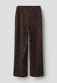 Pantalon à jambes larges en tissu noir à pois blancs. Le matériau présente une texture côtelée, et une taille élastique offre de l'élasticité.