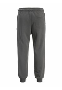 Grå sweatpants med elastisk talje, aftagende ben og en enkelt baglomme. Glat tekstur og ensfarvet. Simpelt design.