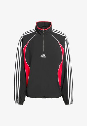 Czarna i czerwona kurtka z zamkiem do pół wysokości, z białymi paskami, wykonana z nylonu, z kołnierzem typu komin i elastycznymi mankietami. Logo Adidas na piersi.