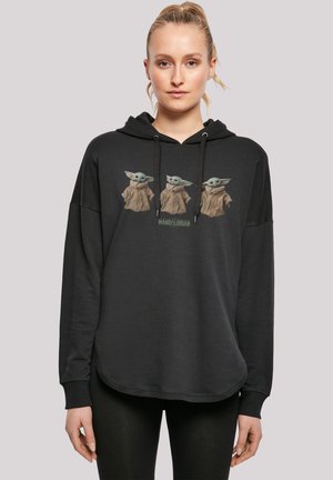 Black hooded sweatshirt with a loose fit, featuring a graphic of three cartoon characters from "The Mandalorian." Soft texture, ribbed cuffs.