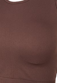 Athlecia FLOW brązowy