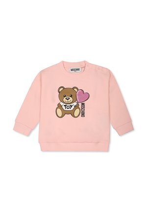 Felpa rosa con maniche lunghe, decorata con una grafica di un orsetto marrone e un cuore glitterato. Include il testo nero "TOY" e polsini a costine.
