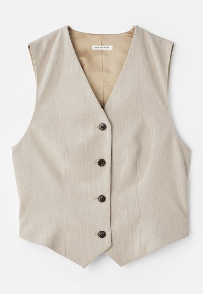 Bež prsluk s teksturiranom tkaninom, v-izrezom i pet tamnih dugmadi. Ima ravno istraženo rub i bez rukava za prilagođeni izgled.