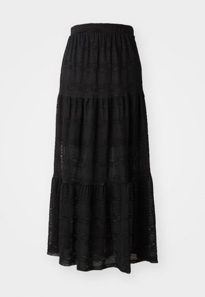 Schwarzer Maxirock aus strukturiertem Stoff, mit einem gestuften Design, gerafftem Saum und dezenten Wellenmustern im gesamten Stoff.