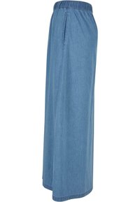 Denim maxi-skirt med elastisk midje, med en flytende silhuett, lyseblå farge og sidelommer for funksjonalitet.