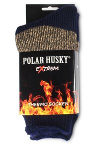 Thermo-Socken in Marineblau mit einem braunen gerippten Strickbereich. Enthält ein schwarzes Verpackungslabel mit weißem Text und Flammen-Design am unteren Rand.