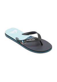 Tongs noires avec une semelle texturée bleu foncé et des accents bleu aqua. Comprend une sangle nervurée et un logo Quiksilver sur la semelle intérieure.