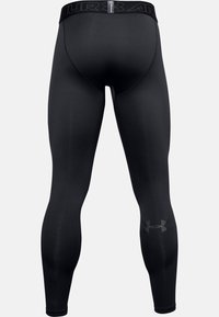 Schwarze Sportleggings aus einem glatten, dehnbaren Stoff. Mit einem hohen Bund und dem Under Armour-Logo am Unterschenkel.