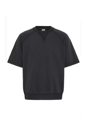 Felpa nera a maniche corte in un tessuto morbido, con maniche raglan, scollatura a girocollo e orlo e polsini a costine.