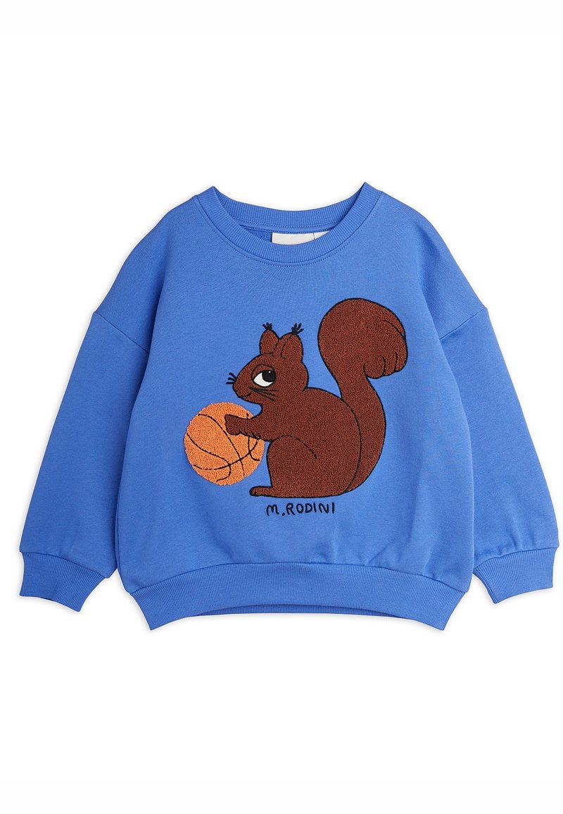 Sweat-shirt bleu avec un écureuil brodé marron tenant un ballon de basketball, avec des poignets côtelés et un col rond. Nom de la marque visible.