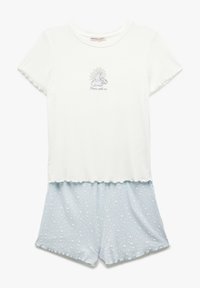 Haut blanc à manches courtes avec une finition texturée et un graphique de soleil. Short bleu clair avec un motif à pois, fabriqué à partir d'un tissu doux et léger.