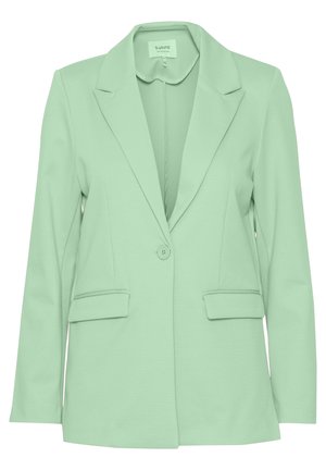 Mintgroene blazer van een gladde stof. Heeft een gekleed kraag, enkele knoopsluiting en twee voorzakken. Strakke lijnen.