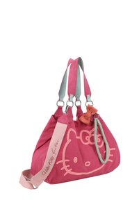 Sac à main en tissu rose avec un design Hello Kitty, agrémenté d'un accent en nœud, de doubles poignées et d'une sangle détachable. Texture douce et forme ronde.