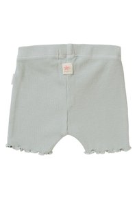 Geribbelde, lichtgroene shorts met een gegolfde zoom. Beschikt over een klein, crèmekleurig label met een roze sterlogo aan de achterkant van de tailleband.