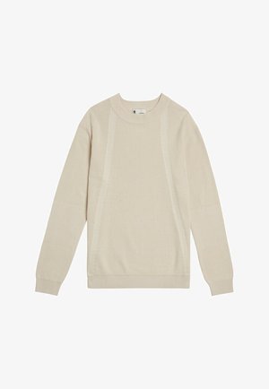 Beige gestrickter Pullover mit langen Ärmeln, gerippter Textur, rundem Ausschnitt und Akzentnähten an den Seiten.