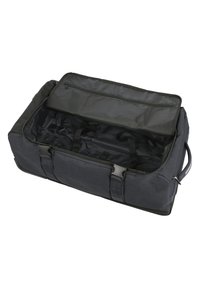 Borsa duffel in tessuto nero con chiusura a zip, dotata di due manici per il trasporto, cinghie interne per fissare il contenuto e un interno liscio e foderato.